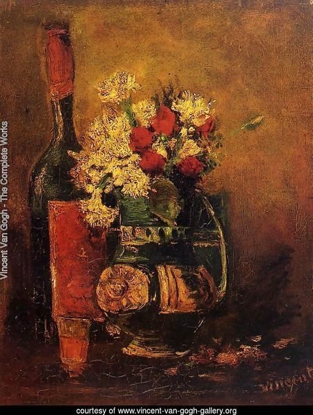 Vase With Carnations And Roses And A Bottle