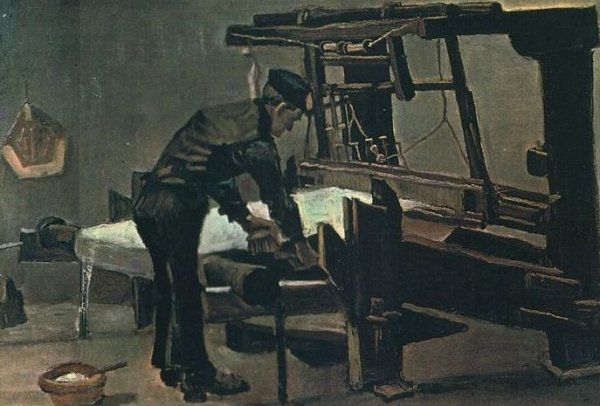 Weaver Standing In Front Of A Loom